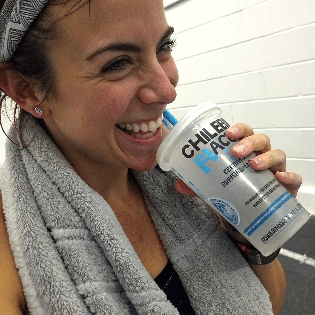 Woman drinking Ice Hack Drink after workout for hydration